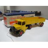 Dinky Supertoys No. 521 Bedford Articulated Lorry, yellow with red wheels, overall good, chipping