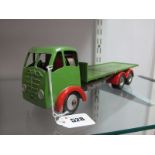 A 1950's Diecast Shackleton Foden Six Wheel Flatback, clockwork, finished in green, signs of wear,