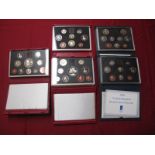 Five Royal Mint United Kingdom Proof Coin Collections, 1986, 1989, 1990, 1996, 1998, both red and