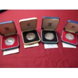 Four Royal Mint United Kingdom Guernsey Silver Proof Crowns, including Bailiwick of Guernsey Royal