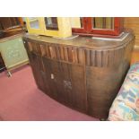 1930's Oak Bow Front Sideboard, with ribbed frontage to twin drawers, 140cm wide.