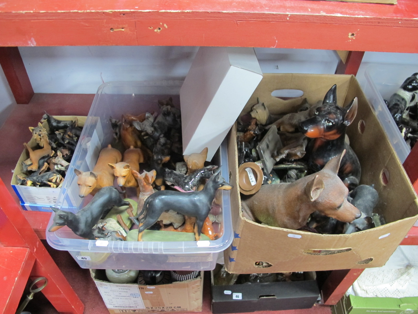 A Large Quantity of Pottery, Resin and Other Figures of Doberman Pinscher Dogs:- Three Boxes