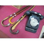 Black Anvil Telephone, with six lower exchange release buttons; together with four walking canes (