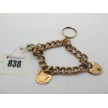 A Hollow Curb Link Bracelet, stamped "9c", to heart shape padlock clasp stamped "9ct", suspending