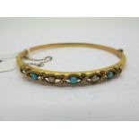 A Chester Hallmarked 9ct Gold Turquoise Set Bangle, hinged to snap clasp (internal diameter 6cm).