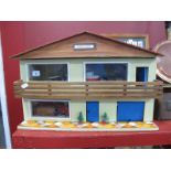 Dolls House, circa 1970's complete with furniture and figures, width 56cm x height 37cm x depth