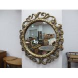 Gilt Framed Circular Wall Mirror, in the Atsonia manner; another oval. (2)