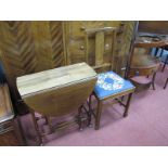 An Early XX Century Mahogany Drop Leaf Sutherland Table, on turned legs, 60cm long, and an