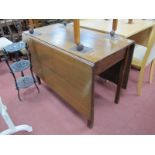 A Georgian Period Oak Drop Leaf Dining Table, on square legs, extended 150 x 106cm.