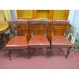 Three XIX Century Mahogany Dining Chairs, each having carved upper back rail on turned legs, stamped