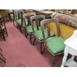 A Set of Six XIX Century Walnut Dining Chairs, each with floret carving to single splat, on turned