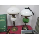XIX Century Oil Lamp, with a white glass shade, green glass well; together with one other XIX
