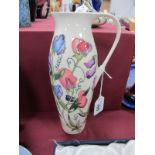 A Moorcroft Pottery Jug, painted in the 'Sweetness' pattern, designed by Nicola Slaney, impressed