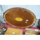 Oval Tea Tray, with batwing inlaid cartouche, wavy gallery and twin brass handles, 59.5cm wide.