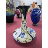 A Moorcroft Pottery Vase, painted in the 'Otley Chevin' pattern, shape 104/6, impressed and