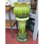 XIX Century Green Pottery Jardiniere on Stand, (damage to Jardiniere).