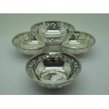 A Set of Four Hallmarked Silver Dishes, each with openwork rim and reeded edge, 10.5cm diameter. (