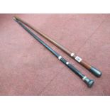 Silver Topped Walking Cane, an ebonised example with dented silver top, (2)
