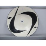America Ware Pottery Circular Shallow Dish, designed by A. Mallory, with black abstract design, on