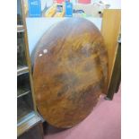 A XIX Century Mahogany Table, with a circular top, bulbous pedestal, on a trefoil base.