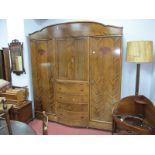 An Early XX Century Mahogany and Oak Triple Wardrobe, with end hanging compartments flanking