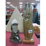 Bevin Chikodzi Mineral Sculpture of figure covering eye with hand, on wooden base, 34cm high
