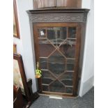 Mahogany Wall Hanging Corner Cupboard, with dentil cornice, blind fretwork panel, over astragal door