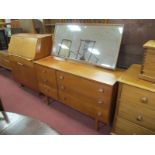 A Teak Dressing Table, with rectangular mirror, three long drawers with three shorter to side,