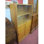 Teak Display Cabinet, circa 1970's with twin glazed sliding doors over twin teak drawers having