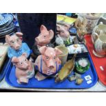 Five Nat West Pigs, (one damaged), Pendelfin Uncle Soames, RAF mug, plated goblets, etc:- One Tray