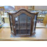 A Dome Top Display Cabinet, 52cm high, 57cm wide.