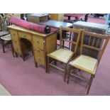 A Pair of Edwardian Spindle Back Bedroom Chairs and a Seven Drawer Dressing Table, 101cm wide, 37.