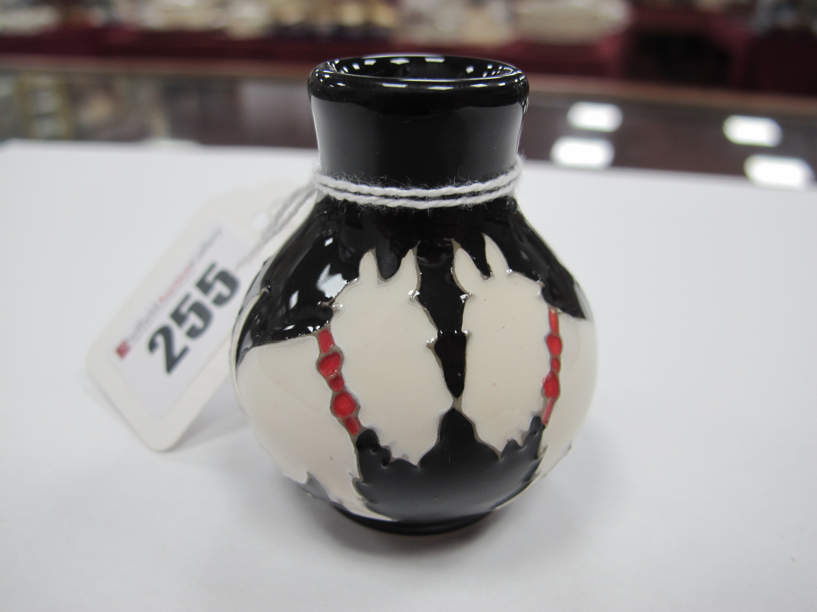 A Moorcroft Pottery Vase, painted in the 'Westie' Dog' pattern, shape 869/2, impressed and painted