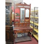 Hardwood Hall Stand in the Edwardian Manner, with swan neck canopy, central mirror over twin