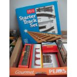 A 'OO' Scale Peco Starter Track Set, (some items missing), a Hornby Track Pack (Complete), Hornby