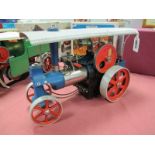 A Wilesco D40 Live Steam Traction Engine, unboxed, in good condition, finished in blue and red,