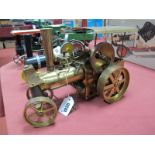 A Wilesco All Brass "Old Smokey" Live Steam Traction Engine, unboxed, good condition with burner.