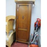 1930's Oak Slender Wardrobe, with panelled door, the interior later shelved, 65cm wide.