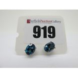 A Pair of Modern Single Stone London Blue Topaz Earstuds, oval four claw set, stamped "925".