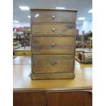 A Victorian Pine Shop Counter, four drawer cabinet with rear advertisement for 'Metlex