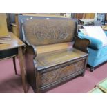 Oak Monks Bench. circa early XX Century, with carving to top, back and fascia, 107cm wide.