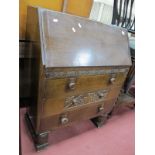 Three Drawer Bureau, circa 1930's, with pokerwork carving on cup and cover supports, 76cm wide.