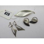 David Andersen; A Norwegian Enamel Leaf Brooch, highlighted in white, stamped "D-A 925S" "Norway