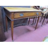 A XIX Century Mahogany Side Table, with single drawer on tapering legs and brass castors, 94.5cm