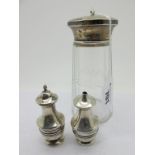 A Hallmarked Silver Topped Glass Sugar Shaker, (dents); together with two hallmarked silver salt/