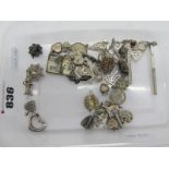 A Collection of Assorted Novelty Charm Pendants, including hedgehogs, seahorse, hearts, spider's