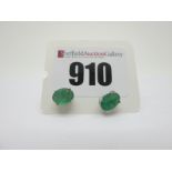 A Pair of Modern Single Stone Emerald Earstuds, oval four claw set, stamped "925".