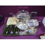 An Art Deco Style Plated Three Piece Tea Set, of octagonal form, on an engine turned tray; a cased