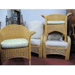 Cane Patio Suite, comprising:- two pairs of easy chairs and coffee table. (5)