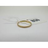 An 18ct Gold Plain Wedding Band, (finger size S) (1.5grams).